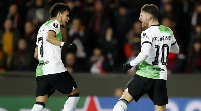 Alexis McAllister celebrates with Luis Diaz (Reuters)