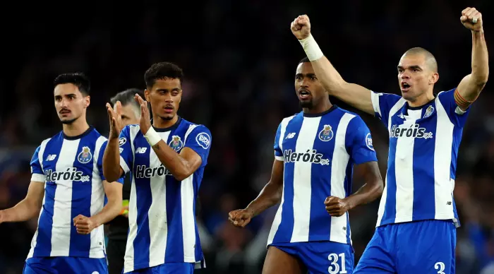 Porto players celebrate Grujic's penalty (Reuters)