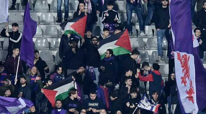 Palestinian flags in the Fiorentina stands (Reuters)