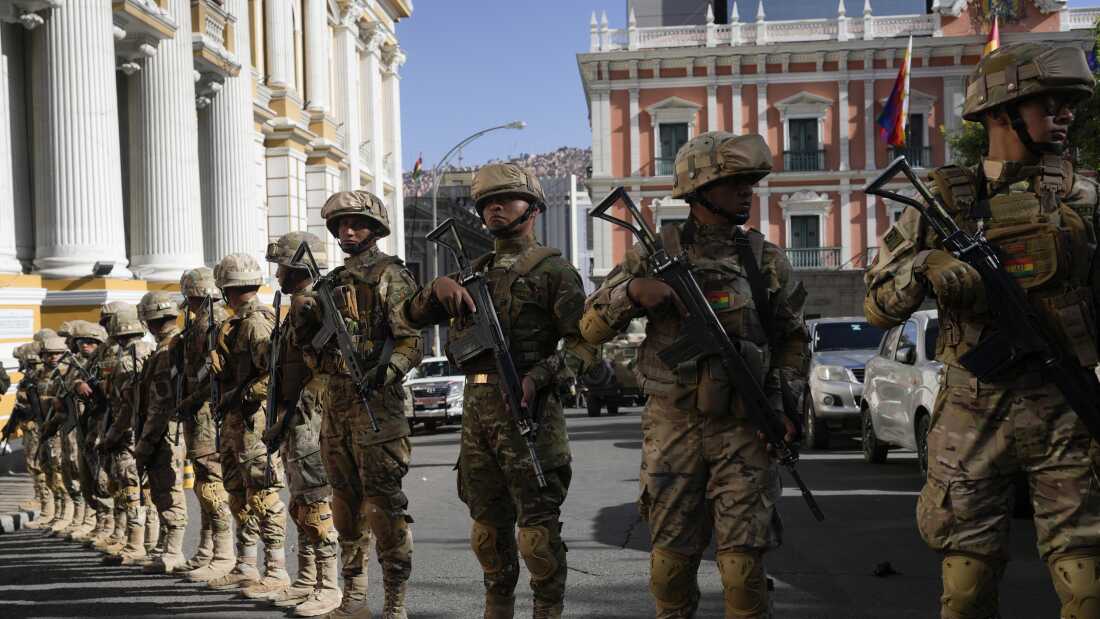 Soldiers block the street in front of the presidential palace (right) and the Legislative Assembly (left) in Plaza Murillo in La Paz, Bolivia, on Wednesday.