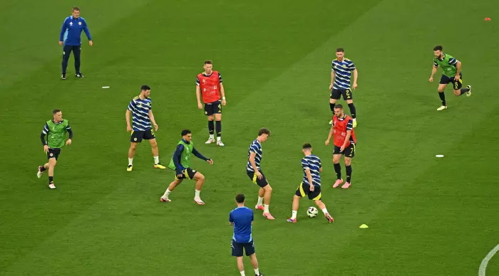 Scotland players warming up (Reuters)