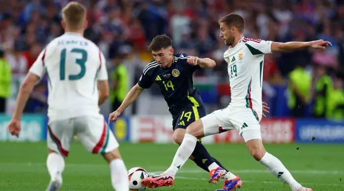 Billy Gilmour in a fight with Barnabas Varga (Reuters)