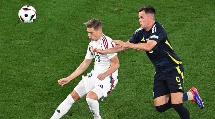 Kevin Chasovot in a fight with Lawrence Shankland (Reuters)