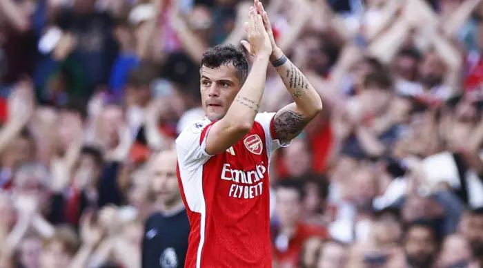 Granit Xhaka thanks the fans on his way off the pitch (Reuters)