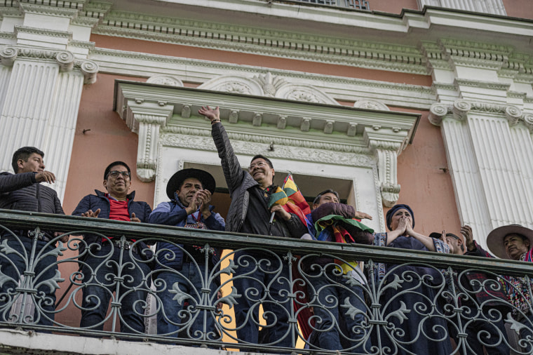 Bolivian president, Luis Arce waves to demonstrators in La Paz, Bolivia, on June 26, 2024.