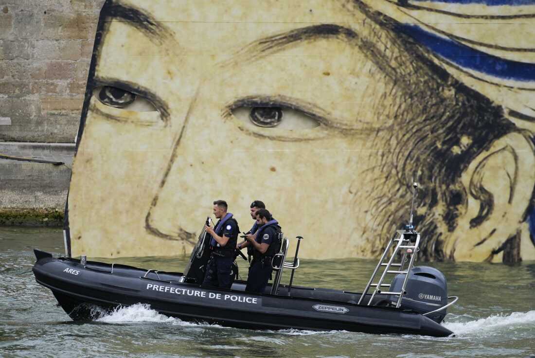 Security patrol by boat in Paris, France, before the opening ceremony of the 2024 Summer Olympics, Friday, July 26.