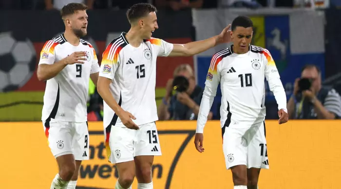 Jamal Musiala celebrates with the players of the German national team (Reuters)