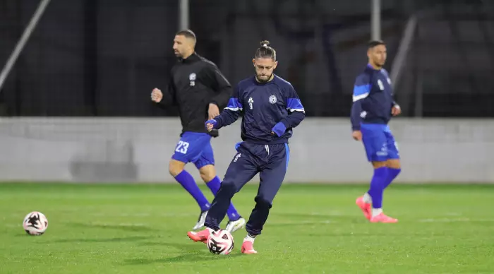 Tiberias players warming up (Omari Stein)