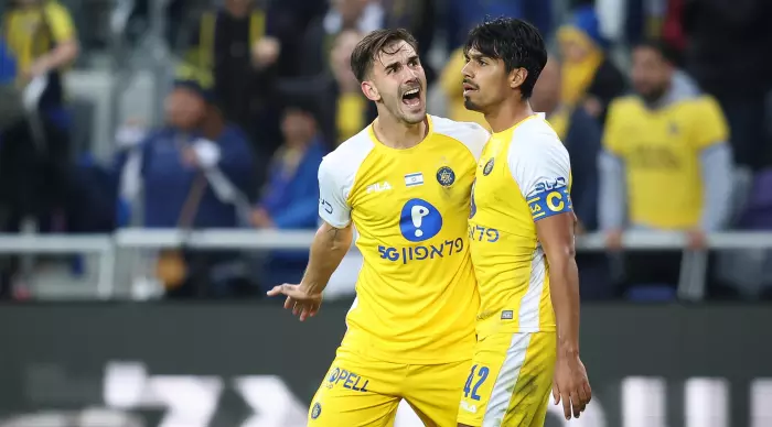 Nemanja Stoic in a frenzy with Dor Peretz (Radad Jabara)