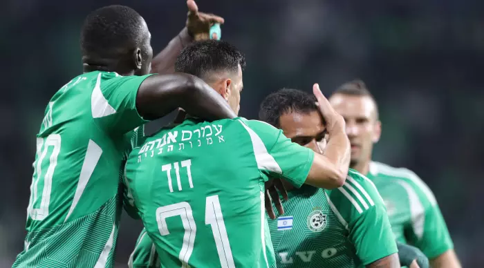 Maccabi Haifa players celebrate with Dean David (Omari Stein)