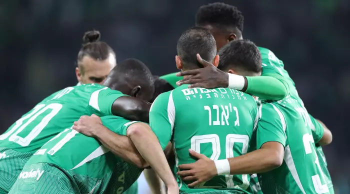 Maccabi Haifa players celebrate with Dean David (Omari Stein)