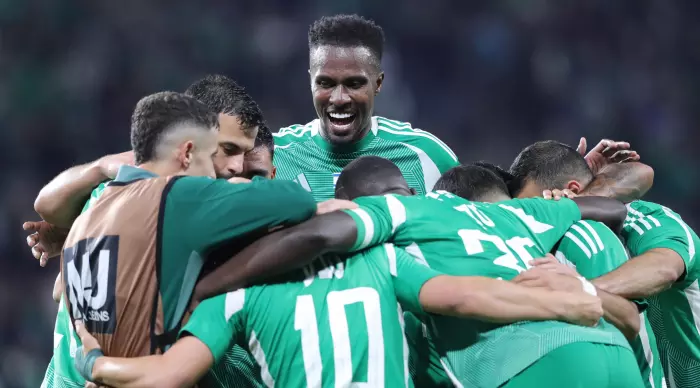 Maccabi Haifa players celebrate with Dia Saba (Omari Stein)