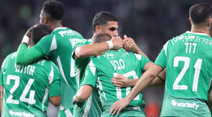 Maccabi Haifa players celebrate with Dia Saba (Omari Stein)