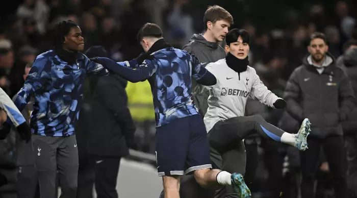 Tottenham players warming up (Reuters)